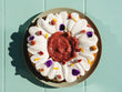 Renversé rhubarbe, huile d'olive, chantilly crème sûre et miel